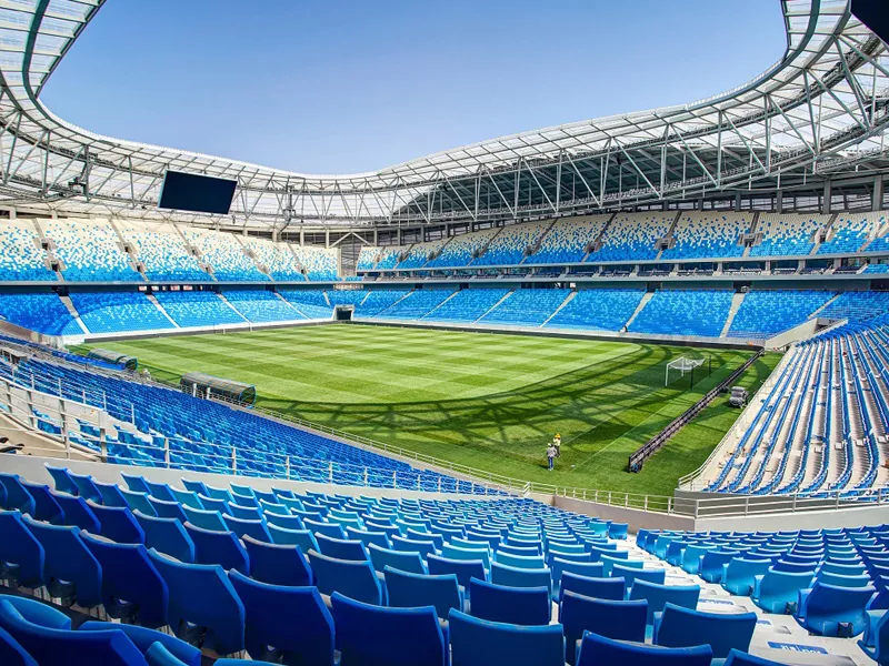 He aha keʻano o ka hanaʻana i ka pāʻani i ka hoʻolālā aesthetic o nā stadiums?